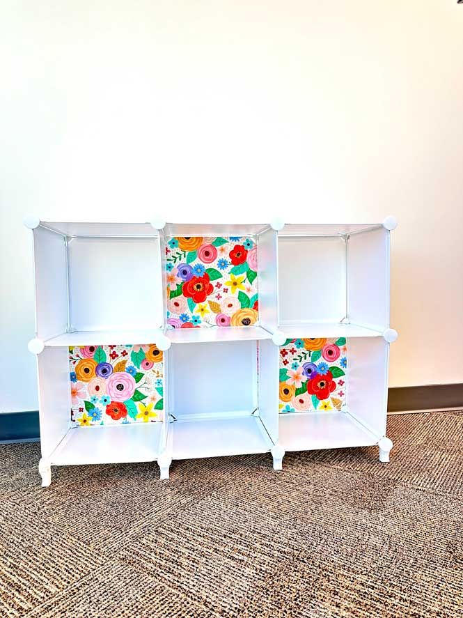 Picture of modular bookshelf that is great as floral classroom decor